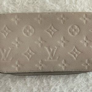 Louis Vuitton Cream Monogram Zippy Wallet